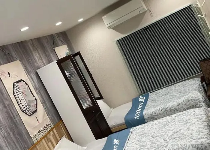梅田難波地铁直达距离地铁站步行5分钟双床间私人浴室家庭式民宿
