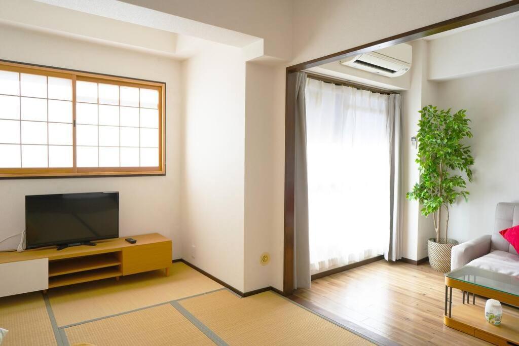 Apartment B401/大阪人气景点黑门市场步行6分钟，日本桥、难波、心斋桥、道顿堀步行可达 Osaka