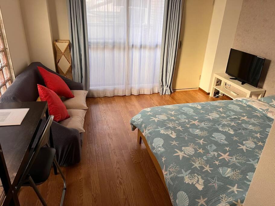 Apartment B403/大阪人气景点黑门市场步行6分钟，日本桥、难波、心斋桥、道顿堀步行可达 Osaka