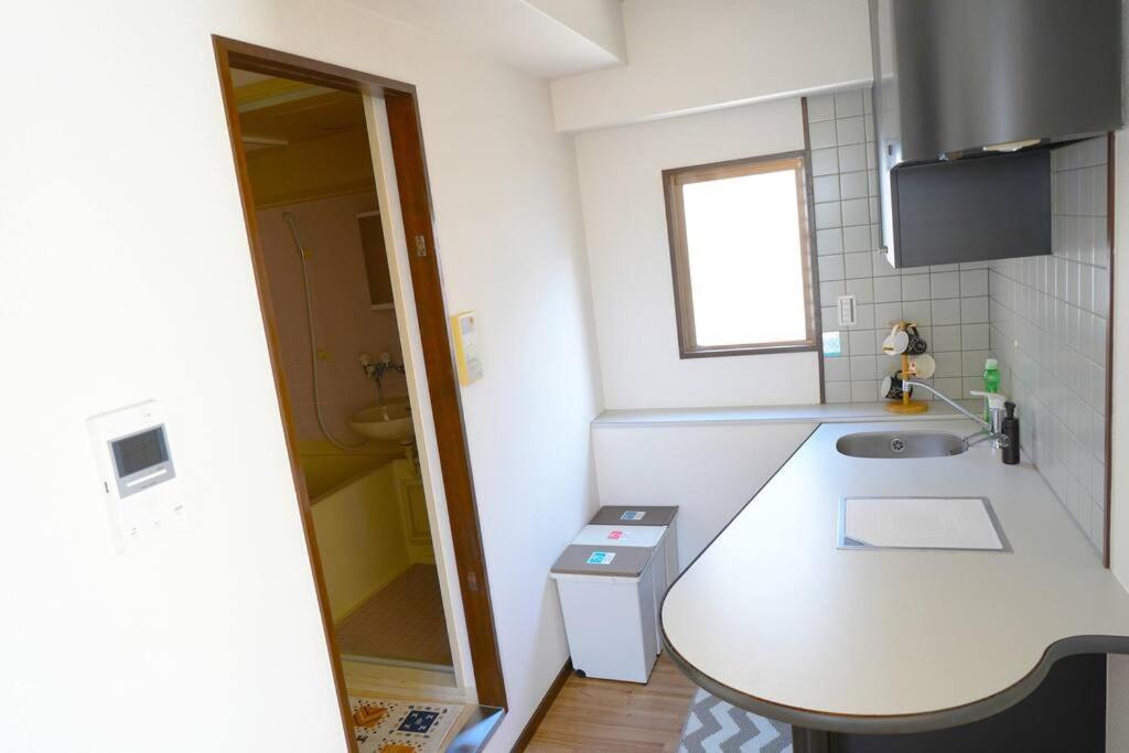 Apartment B401/大阪人气景点黑门市场步行6分钟，日本桥、难波、心斋桥、道顿堀步行可达 Osaka