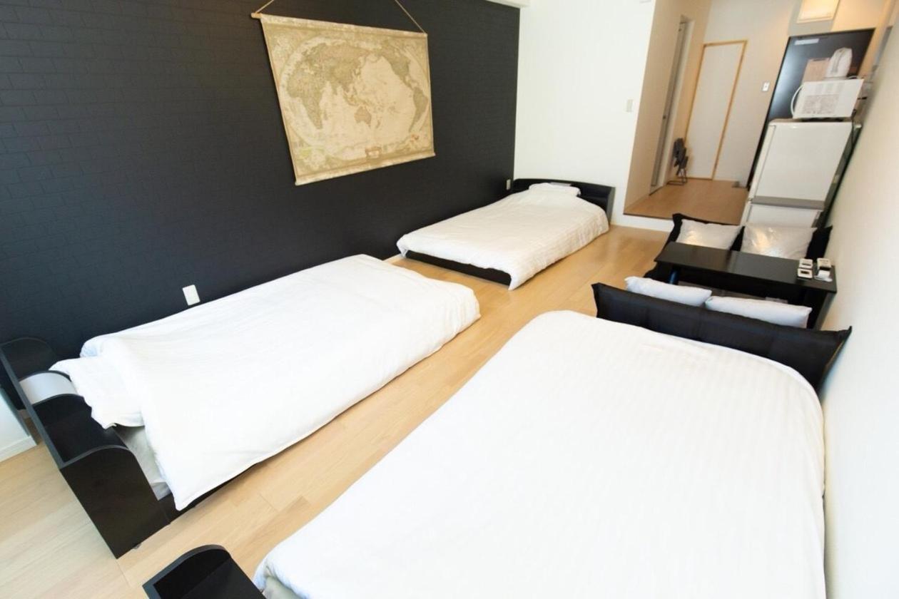 ゲストハウス大国町駅前 Apartment *
