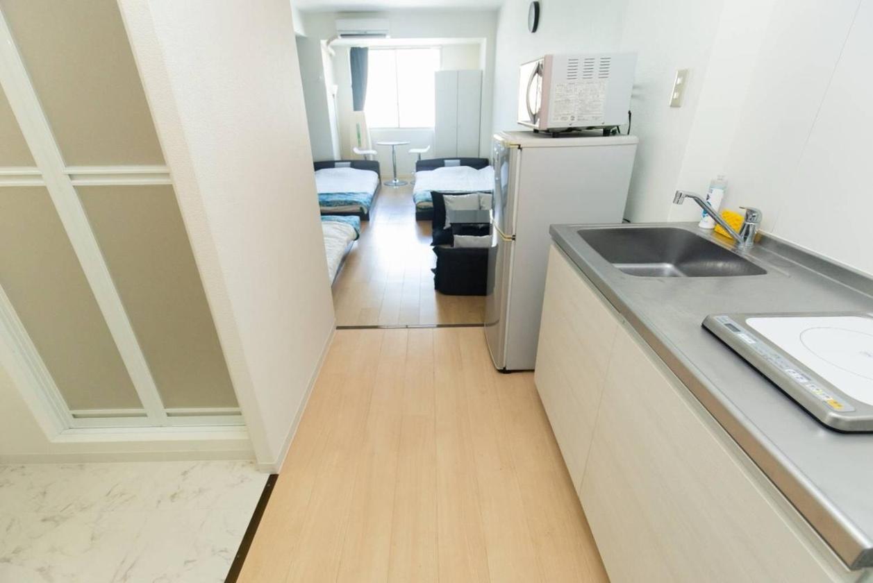 ゲストハウス大国町駅前 Apartment *
