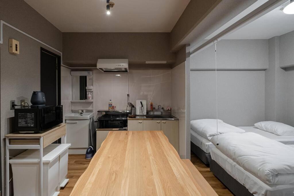 Apartment Tasoneurbanstayosaka なんば日本橋南不夜城708 *