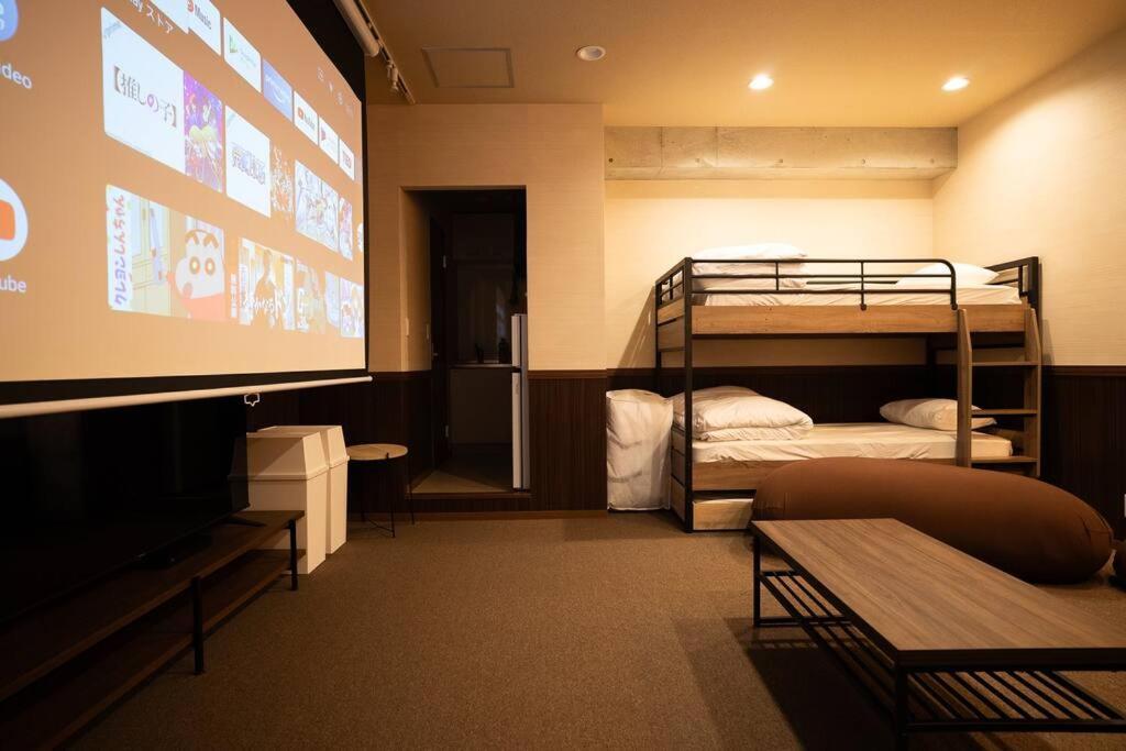 Apartment Tasoneurbanstayosaka なんば日本橋アースヒルズ101 Osaka