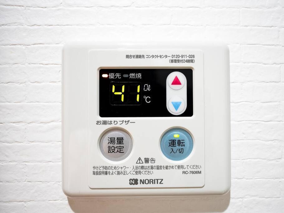 Apartment Tasoneurbanstayosaka なんば日本橋アースヒルズ101 Osaka
