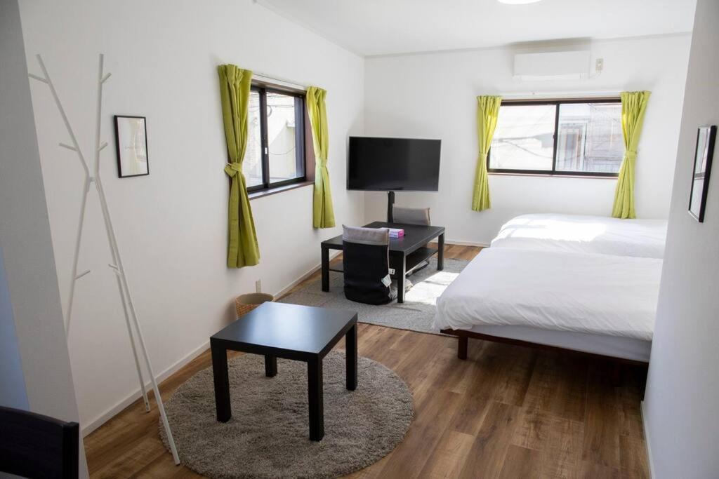 Apartment ゲストハウスわん花園北