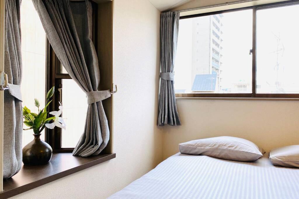 Holiday home 彬ーjr大阪環状線、近鉄駅、地下鉄 徒步5分、天然温泉、鶴橋焼肉観光。usj、心斎橋直通、交通便利 Osaka