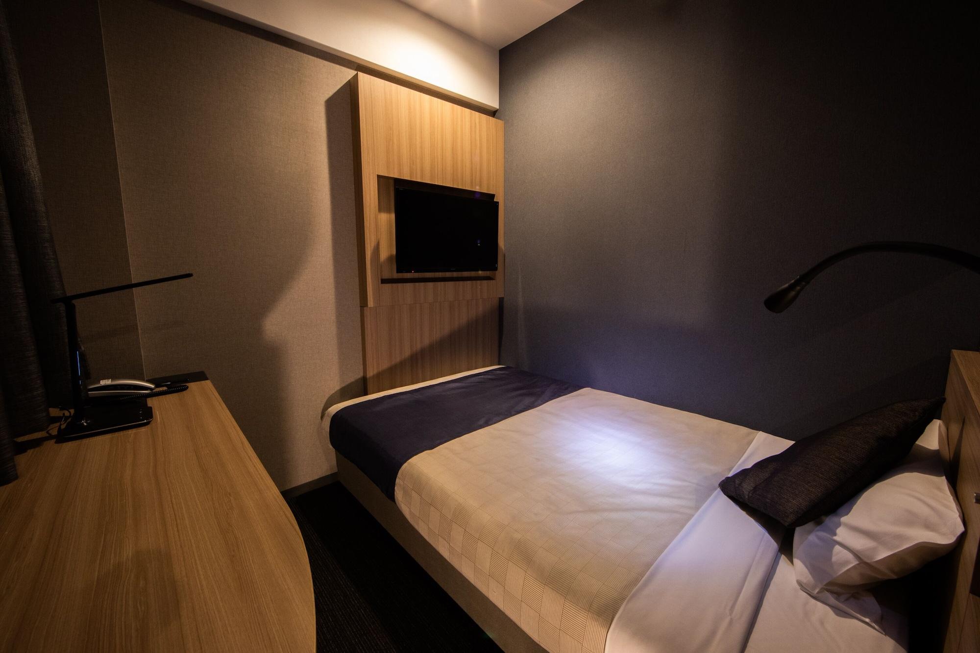 Quintessa Shinsaibashi Comic & Books Hotel