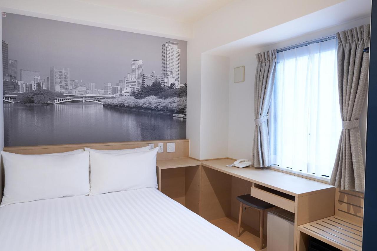 Travelodge Honmachi 3*
