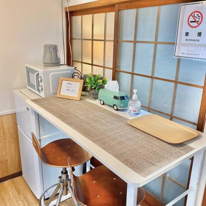 天下茶屋駅5分、専用庭付き平屋—kik Iハウス