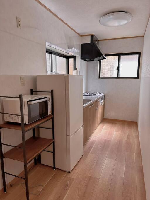 Apartment Cozy Sanchome: Namba-nippombashi Comfort Near Shopping Streets