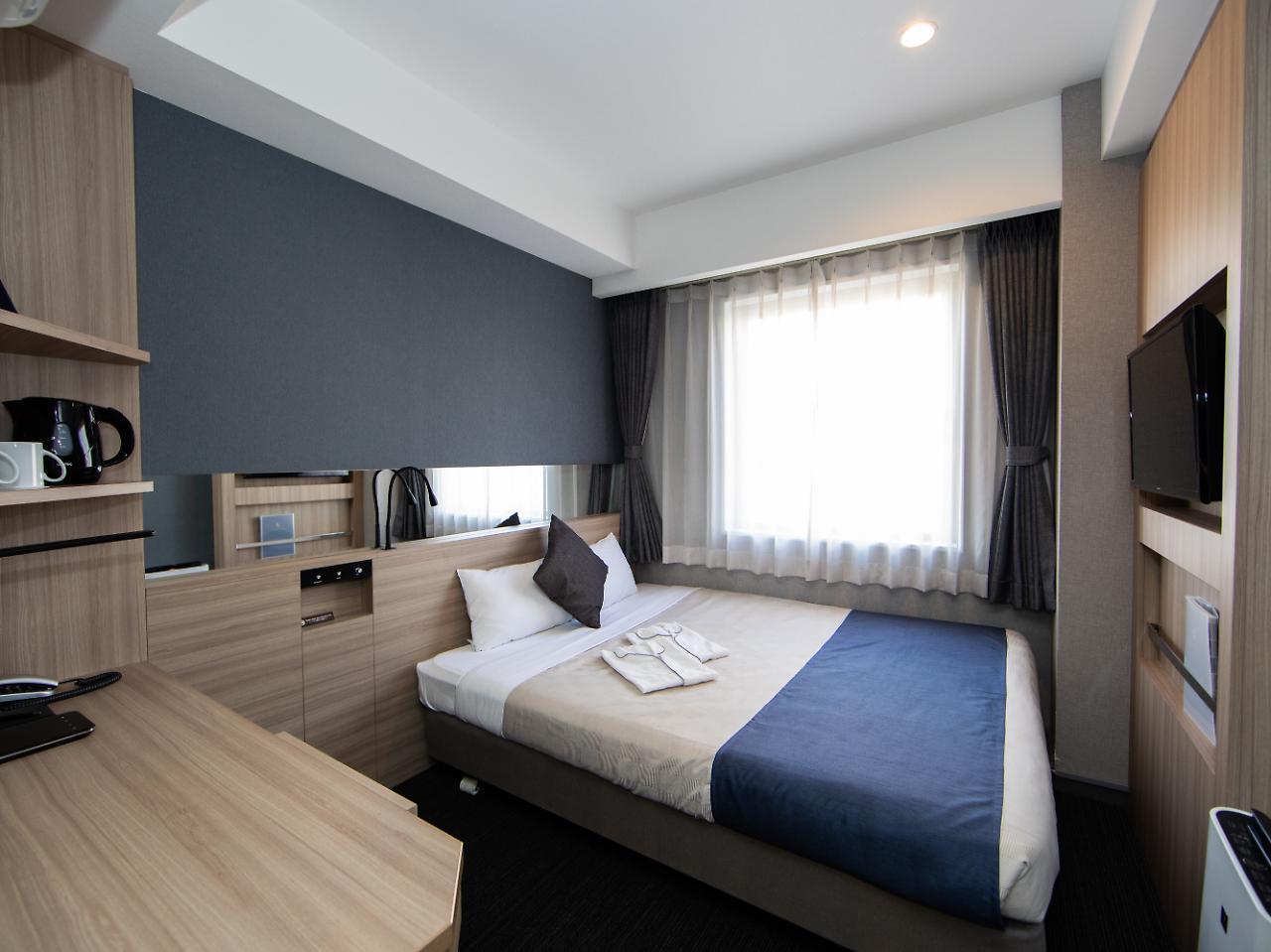 Quintessa Shinsaibashi Comic & Books Hotel Osaka