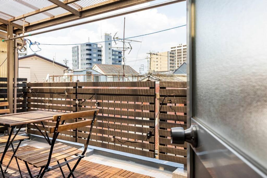 Apartment ｕｓｊ,万博,梅田への交通抜群,ファミリーで安心のguesthouse-泉- Osaka