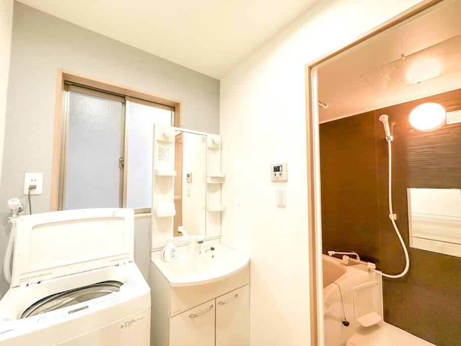 全新～和風獨立屋*兩浴兩衛*商店街*大型超市*車站4分鐘*機場鐵路35分鐘直達 提供接送機/導遊服務