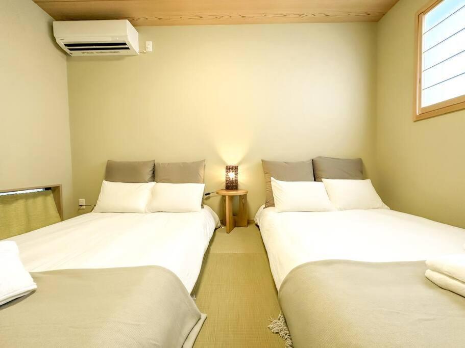Holiday home 全新～和風獨立屋*兩浴兩衛*商店街*大型超市*車站4分鐘*機場鐵路35分鐘直達 提供接送機/導遊服務