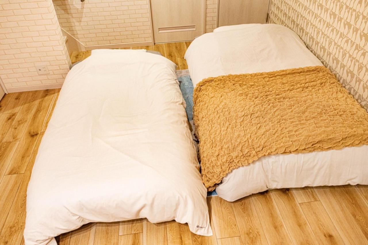 Holiday home 9人可 貸切一軒家 Usj電車14分!海遊館3駅!なんば3駅!通天閣3駅!大阪城電車15分!京セラドーム徒歩15分! 赤ちゃん子ども歓迎!mackey's House! *
