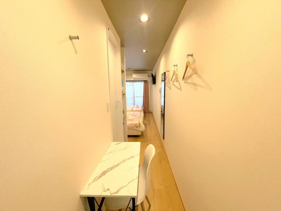 Nipponbashi Dotonbori Retreat: Central Comfort Near Markets Apartment *