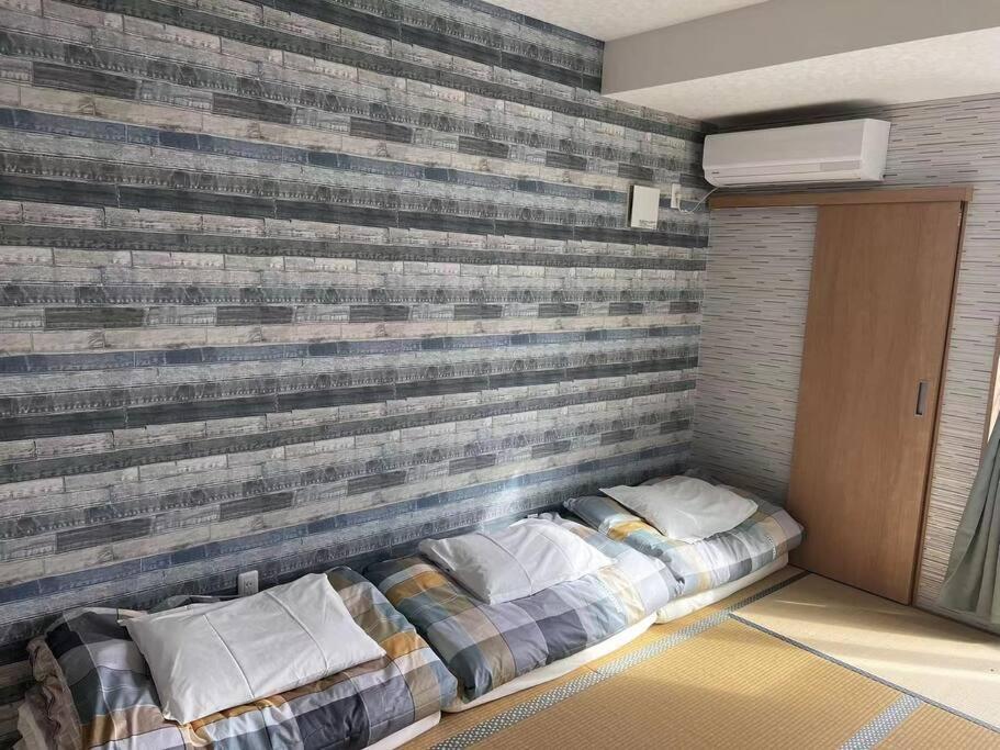Apartment 全新上线花跡民宿4号馆303 萩之茶屋站一分钟！难波，心斋桥4分钟车程！通天阁，天王寺步行圈！ Osaka