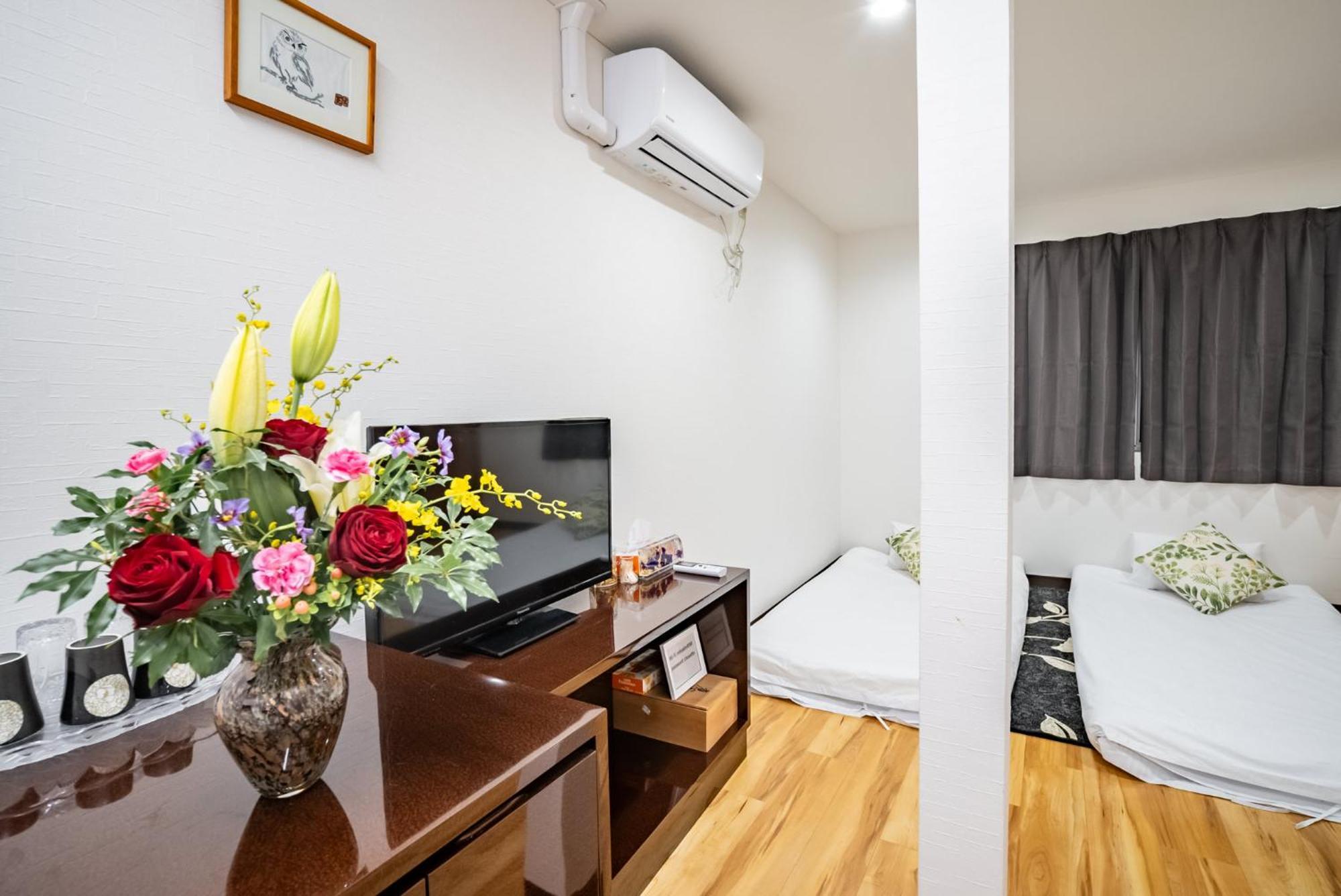 Apartamento 梟の宿 岛之内2号馆 步行200m至道顿堀! 徒步5分钟日本桥站! 心斋桥8分钟 黑门市场15分种徒步圈内 !中央区66平方2间房可住7人 Osaka