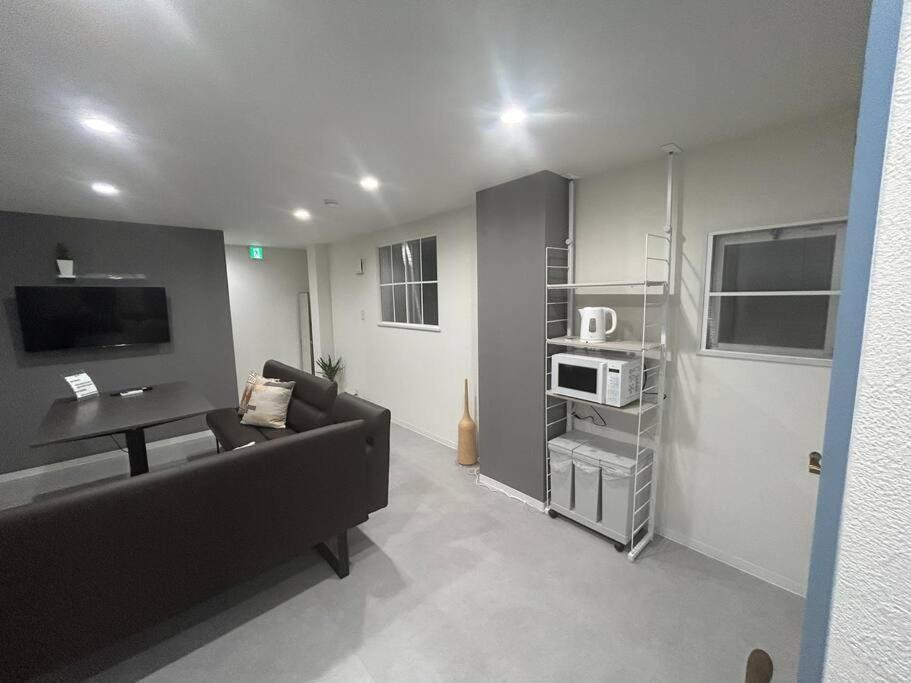 Apartment Usj駅近、難波梅田アクセス便利、ファミリー単身向け、マリオ部屋もあります！一棟貸し。 Osaka