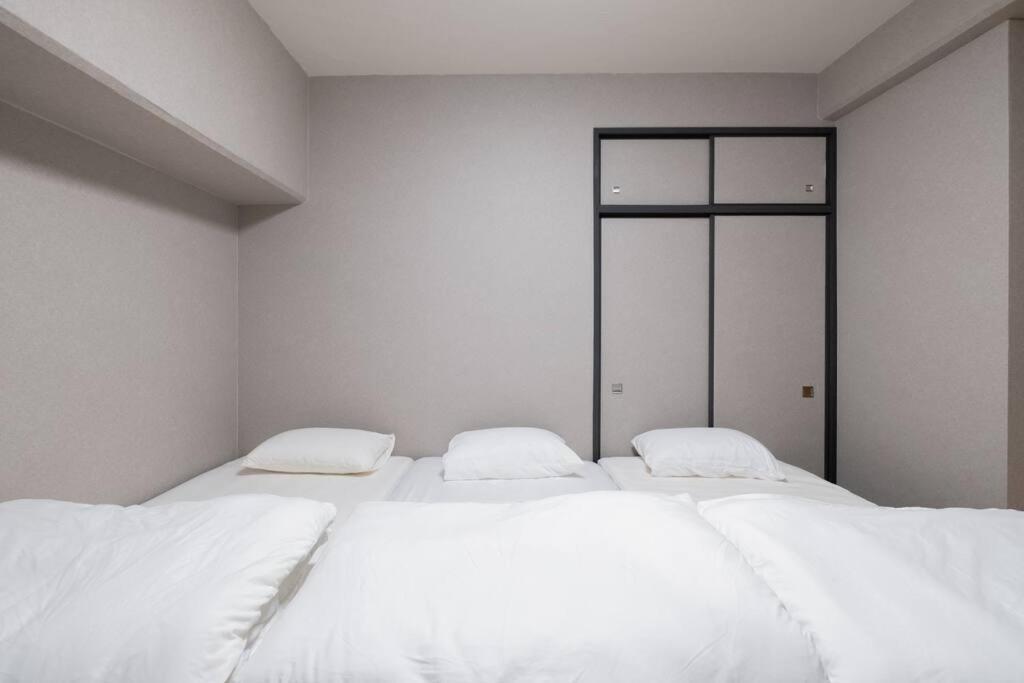 Apartment Tasoneurbanstayosaka なんば日本橋南不夜城706 *