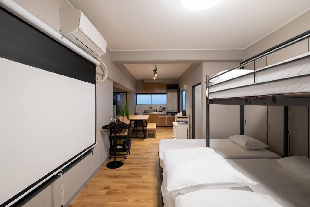 Tasoneurbanstayosaka なんば日本橋南不夜城705 Apartment