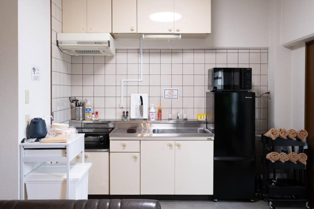 Apartment Tasoneurbanstayosaka なんば日本橋南不夜城702 Osaka