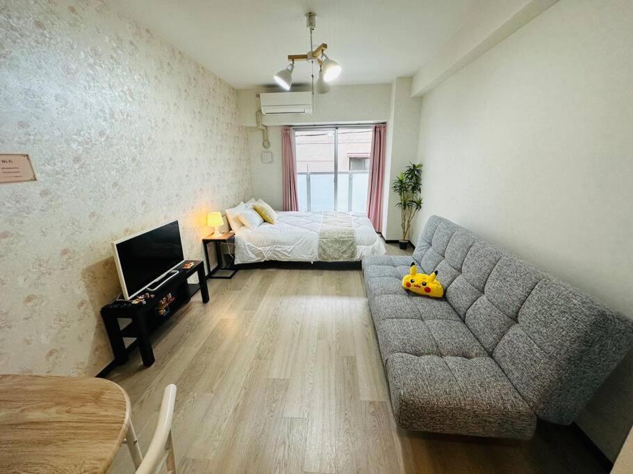 202 黒門市場1分!道頓堀まで徒歩8分!心斎橋まで徒歩9分! Apartment Osaka
