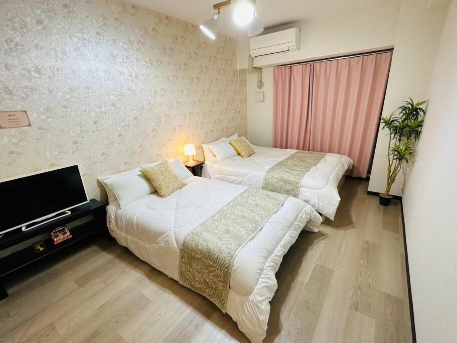 202 黒門市場1分!道頓堀まで徒歩8分!心斎橋まで徒歩9分! Apartment
