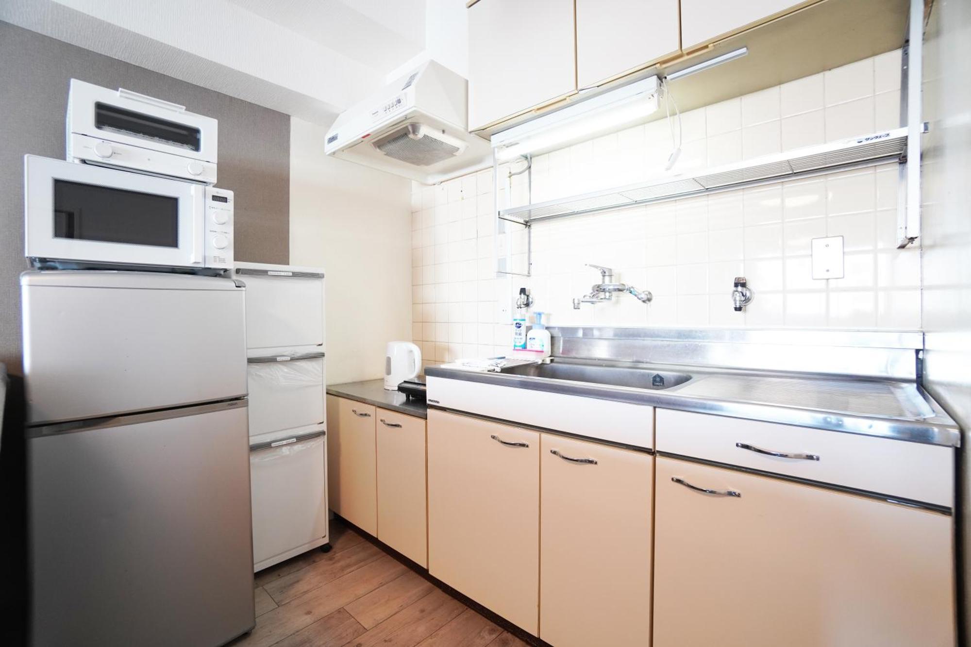 Apartment Tsurigane Building *