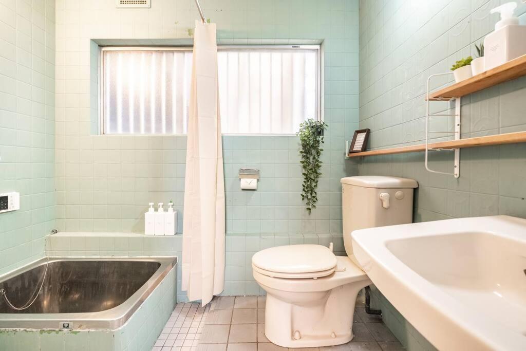 ｕｓｊ,万博,梅田への交通抜群,ファミリーで安心のguesthouse-泉- Osaka