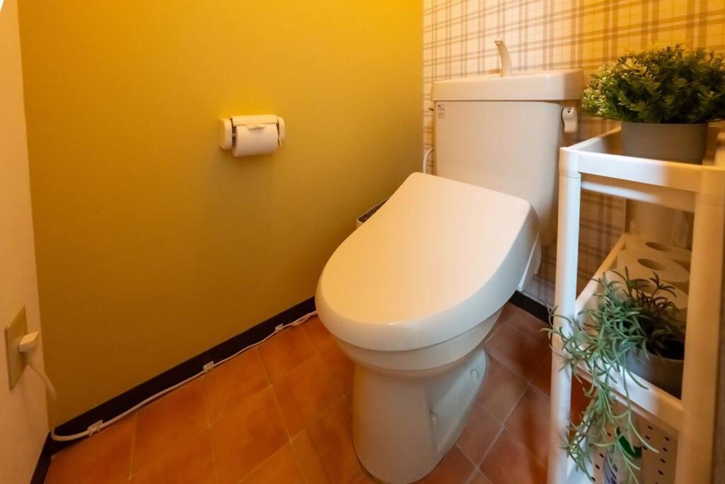 Apartamento 難波駅、道頓堀のそばでシンプルステイ　ベッド3台のお部屋