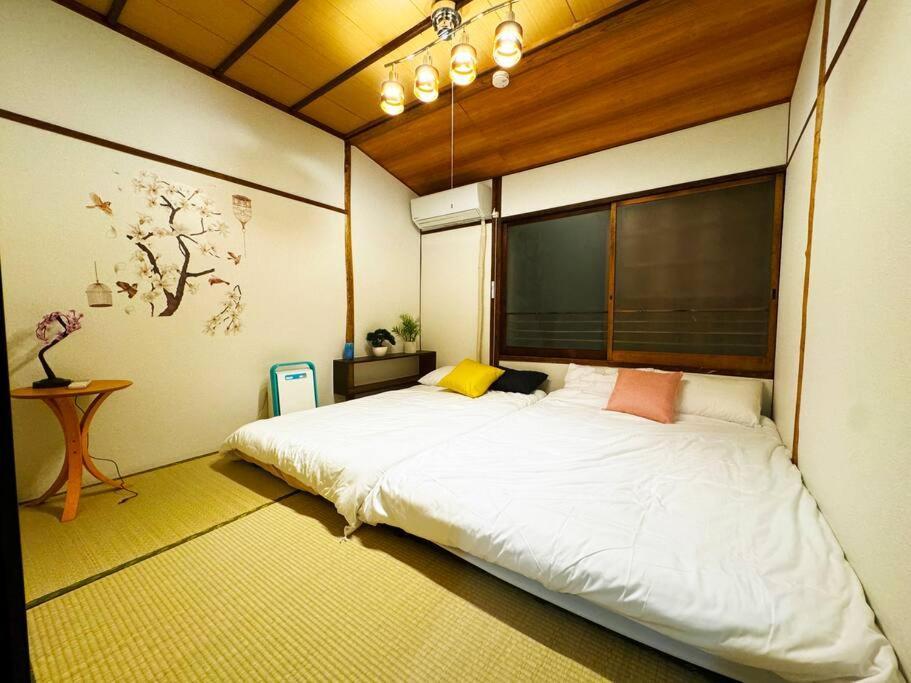Apartment Kenchi House, 2-minute Walk From Nihonbashi Station And Kuromon Market Osaka