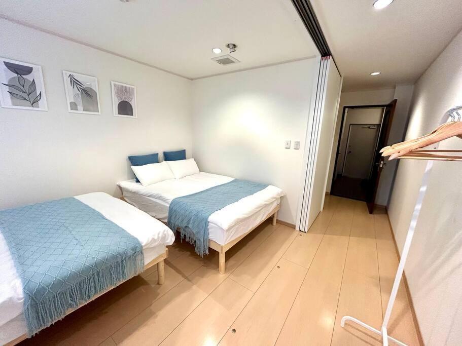 鶴橋駅徒歩4分/道頓堀・なんばへ地下鉄4分/広々スペース3階戸建て貸切 Apartment Osaka