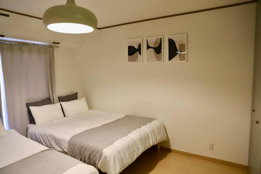 鶴橋駅徒歩4分/道頓堀・なんばへ地下鉄4分/広々スペース3階戸建て貸切 Apartment