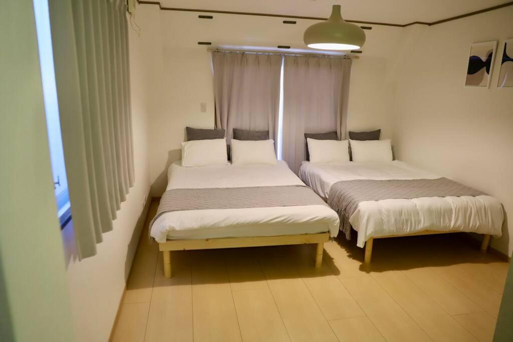 Apartment 鶴橋駅徒歩4分/道頓堀・なんばへ地下鉄4分/広々スペース3階戸建て貸切