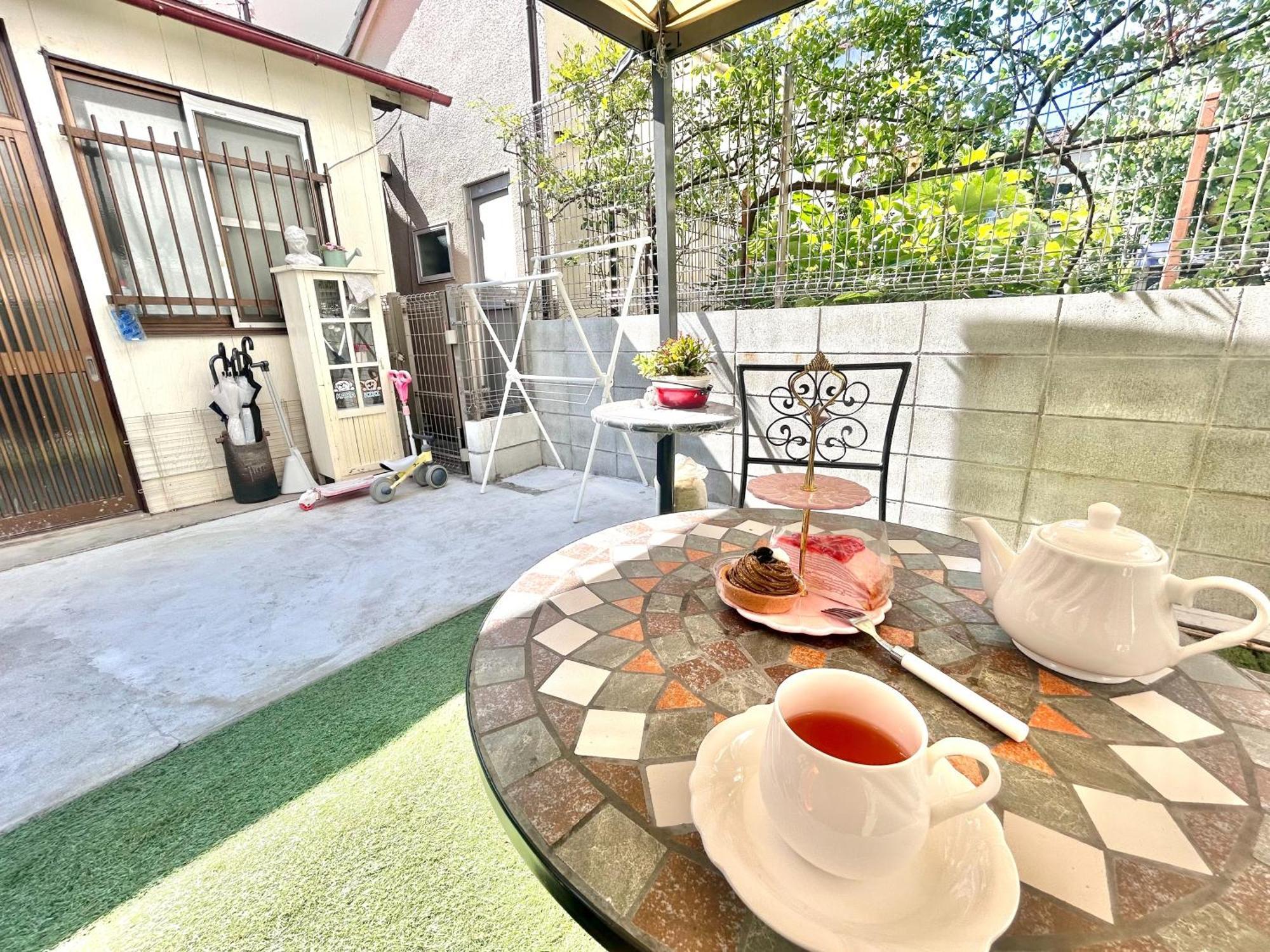 Holiday home 天下茶屋駅5分、専用庭付き平屋—kik Iハウス
