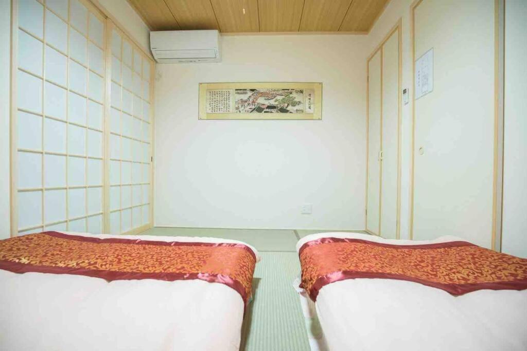 飛 西成区三层120平独栋日式别墅 免费停2台车 4卧室7床和36平的超大客厅 地铁2站5分钟可到难波或者天王寺 走路 4分钟可到花園町地铁站