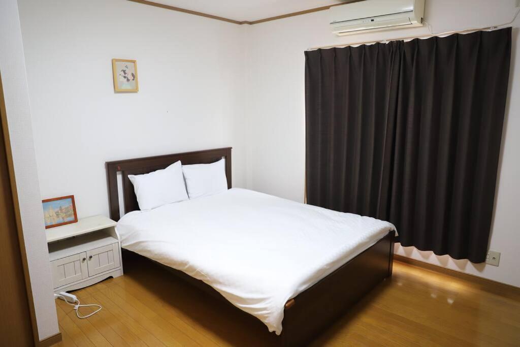 Villa 난바 도톤보리 7분,주차장있는 침대방 3개 다다미방 1개 단독주택,최대12명,지하철역 4분 Osaka