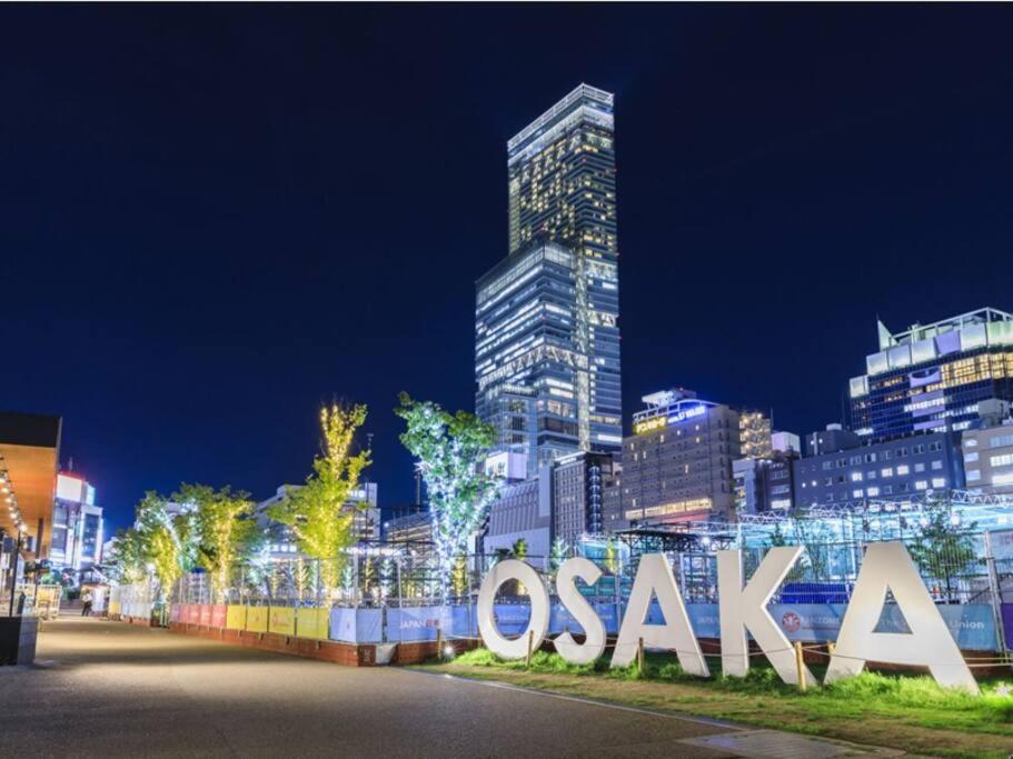101号室花園町駅と萩之茶屋駅各徒歩2分ベット2台専用バスルーム付きな格安民泊 Apartment Osaka