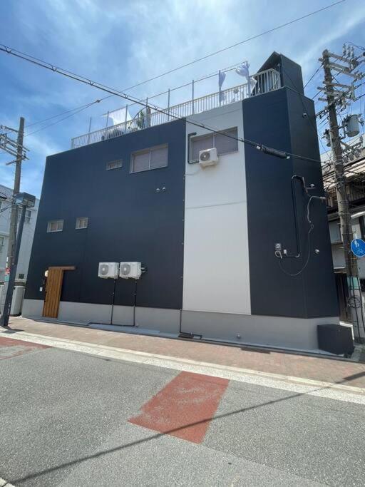 Nico!サウナ!ハンモック!yogibo!大画面プロジェクター!非日常の暮らし 寝室5つ トイレお風呂3台 Osaka