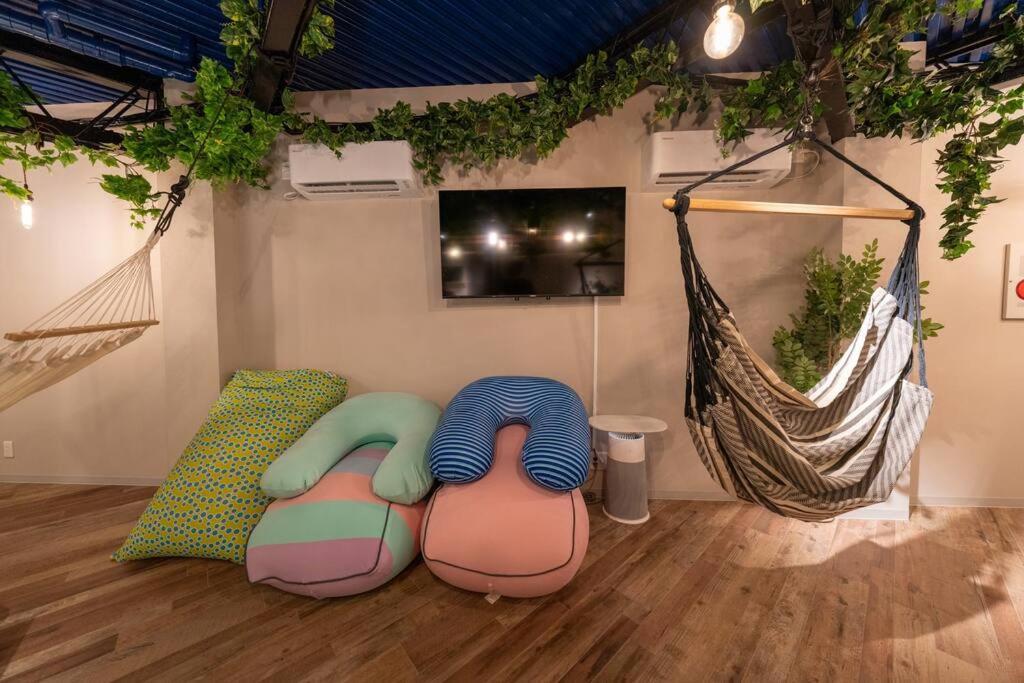 Nico!サウナ!ハンモック!yogibo!大画面プロジェクター!非日常の暮らし 寝室5つ トイレお風呂3台 Osaka