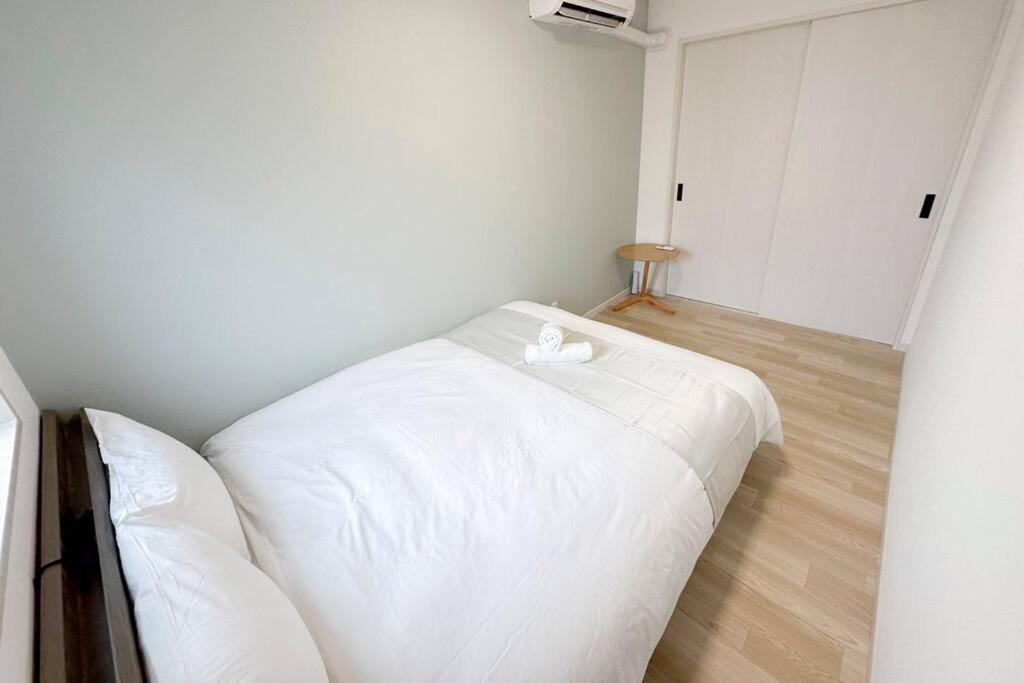 Holiday home 難波 梅田までアクセス良好 3階建ての一軒家を貸切 3寝室あり 最大7名様宿泊可能