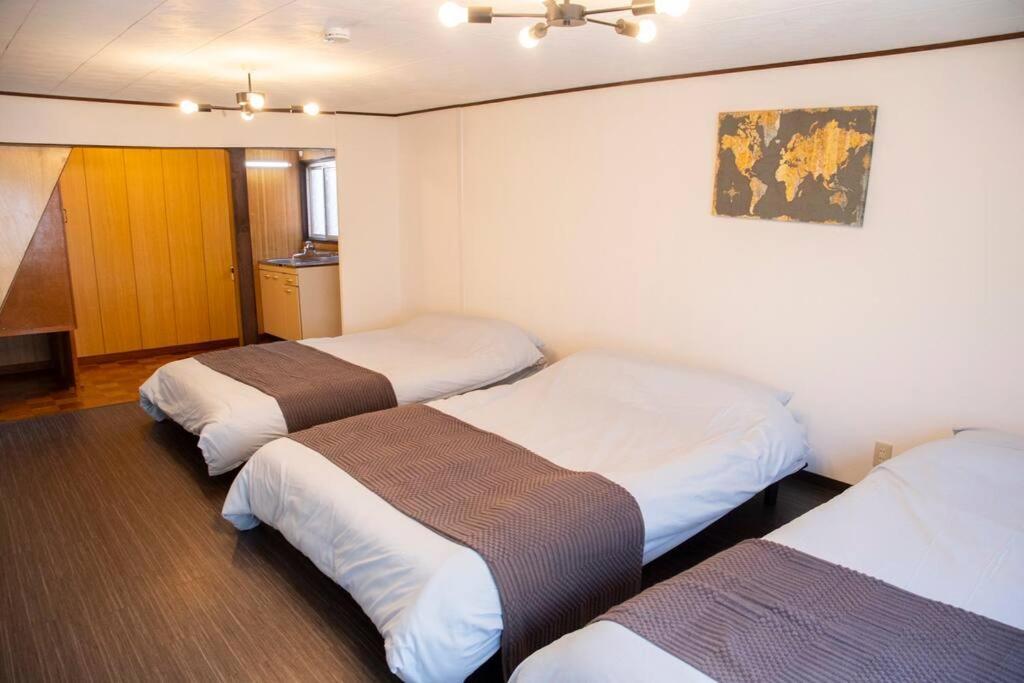 大正 Guest House! Usjと心斎橋へアクセス抜群!京セラドーム近くの大正駅徒歩5分!12人宿泊可能!一軒家貸切! * Osaka