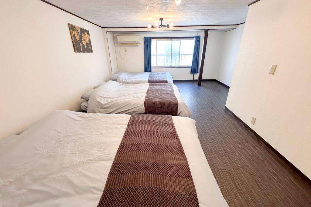 大正 Guest House! Usjと心斎橋へアクセス抜群!京セラドーム近くの大正駅徒歩5分!12人宿泊可能!一軒家貸切! Osaka