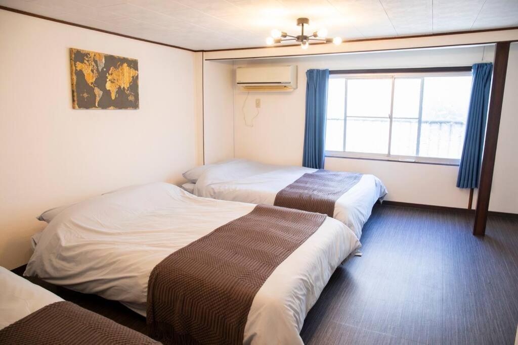 大正 Guest House! Usjと心斎橋へアクセス抜群!京セラドーム近くの大正駅徒歩5分!12人宿泊可能!一軒家貸切!