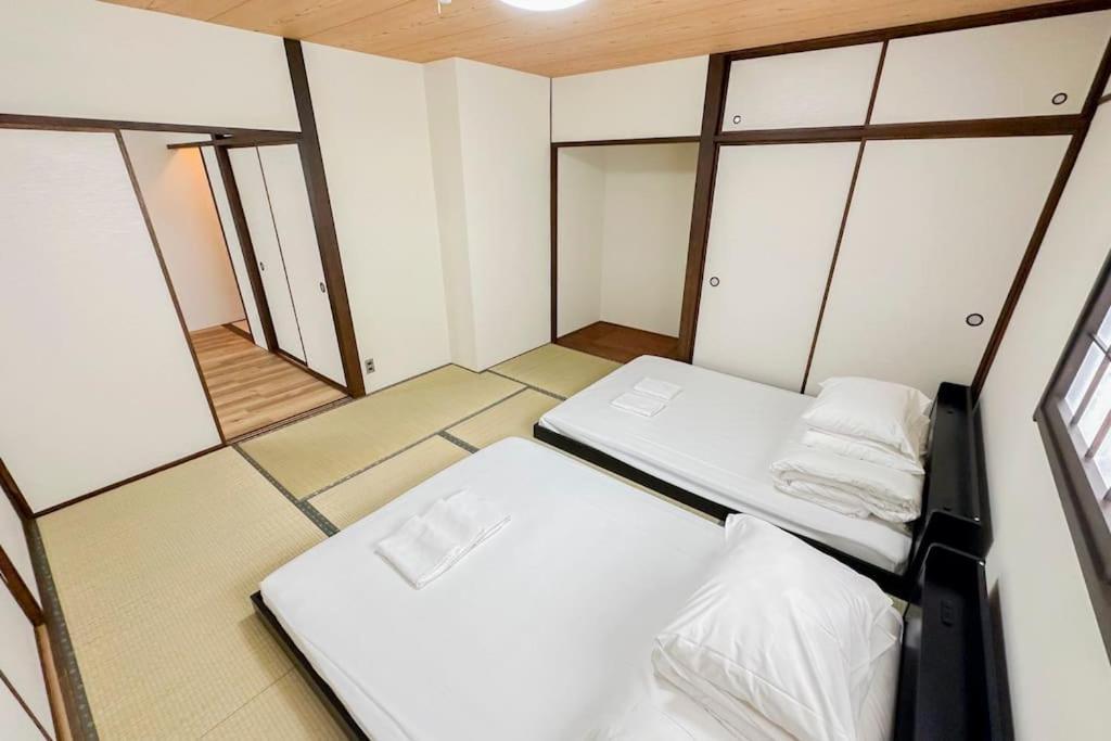 Villa 今宮 Guest House! 難波まで1駅!道頓堀とusjへアクセス抜群!jr線から徒歩4分!最大16人宿泊可能!貸切4ldk Osaka
