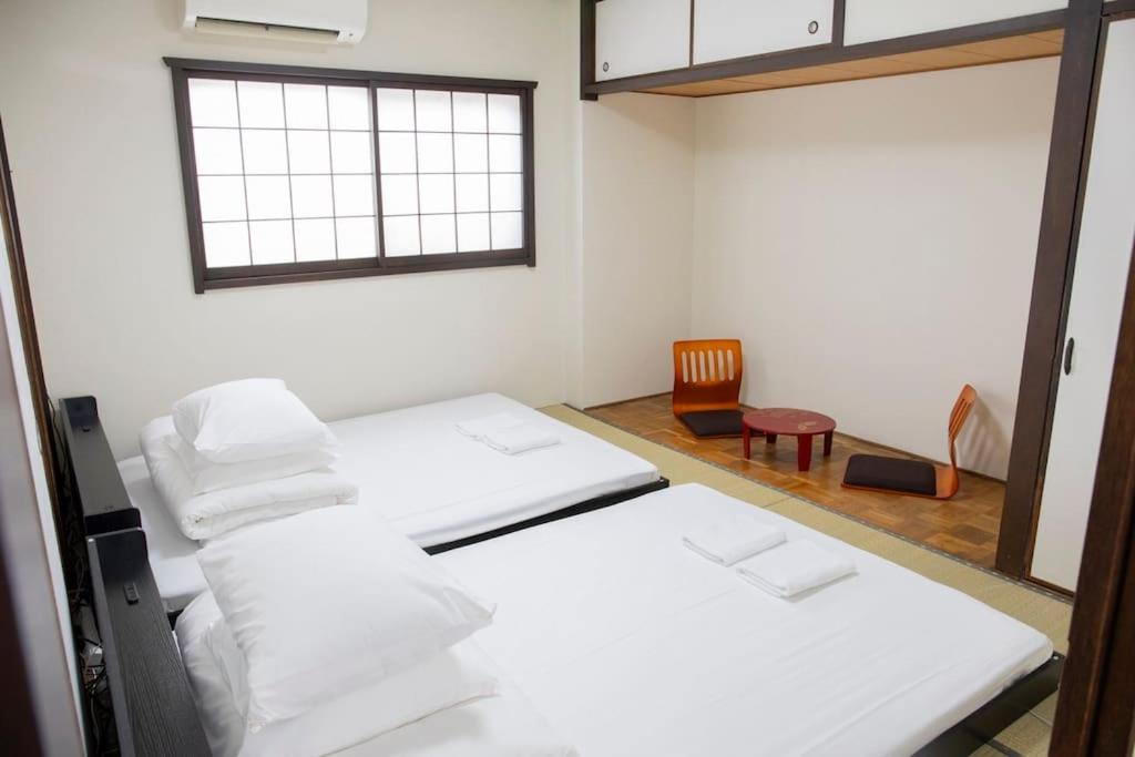 Villa 今宮 Guest House! 難波まで1駅!道頓堀とusjへアクセス抜群!jr線から徒歩4分!最大16人宿泊可能!貸切4ldk Osaka