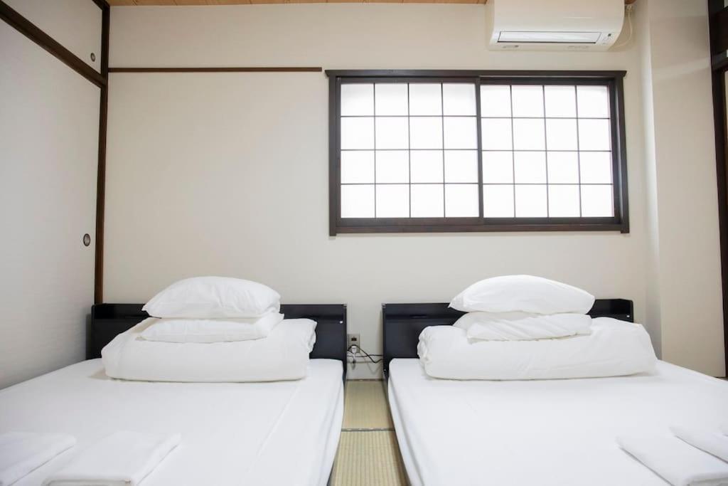 Villa 今宮 Guest House! 難波まで1駅!道頓堀とusjへアクセス抜群!jr線から徒歩4分!最大16人宿泊可能!貸切4ldk