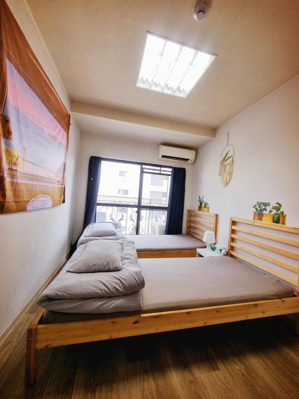 네코하우스 난바점 Apartamento Osaka